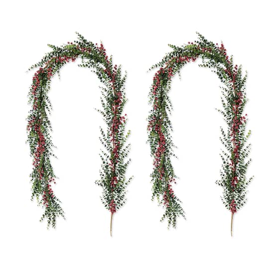 Glitzhome® 9ft. Christmas Greenery PE Dripping Eucalyptus Garland with Red Berries, Set of 2